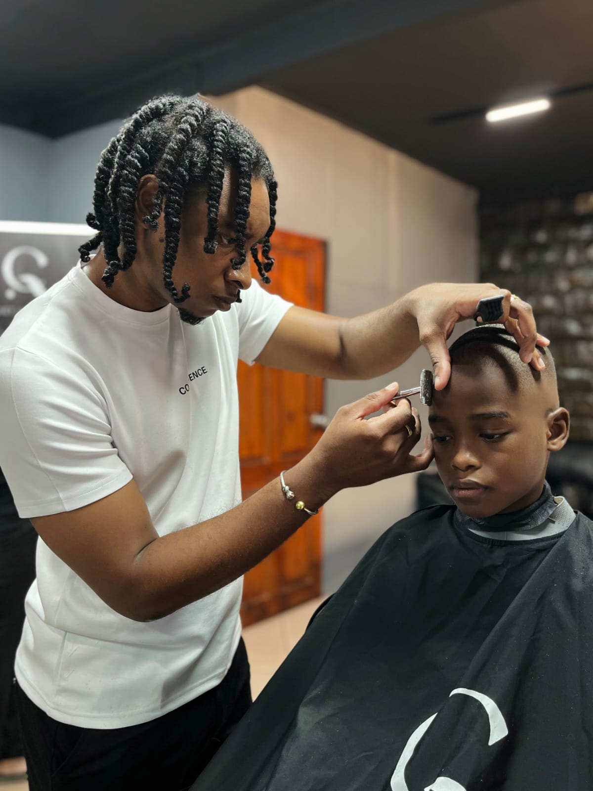 Kinderknipbeurt met scherpe fade bij Quiet Confidence